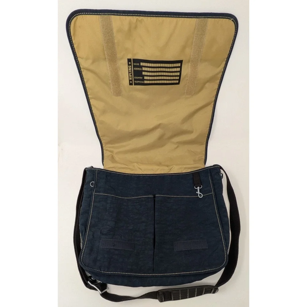 Kipling Madhouse Postman Bag Mirage Las Vegas Logo Expandable Messenger Bag Blue